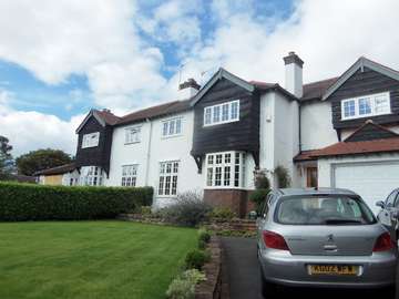 Mr & Mrs L. Lower Heswall Wirral : Installation to the two properties of whitewood 2800 PvcU windows with astragal bar design design glass and Dummy vets to match the original timber windows Aluminium windows Southport liverpool